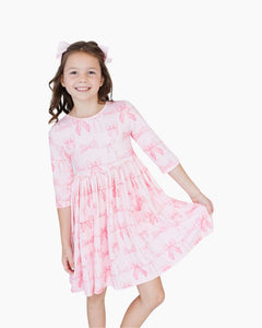 LS BLUSHING BOWS POCKET TWIRL DRESS